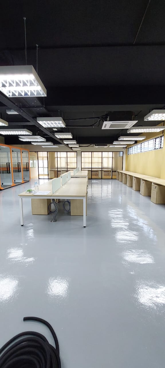 Bank Islam Cyberjaya fitted office area showing worktops, partitions, ceiling lighting and grey flooring