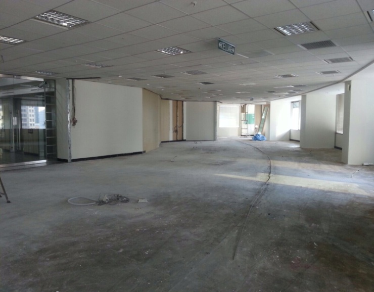 Cleared Level 14 office floor at Menara Maxis after strip-out